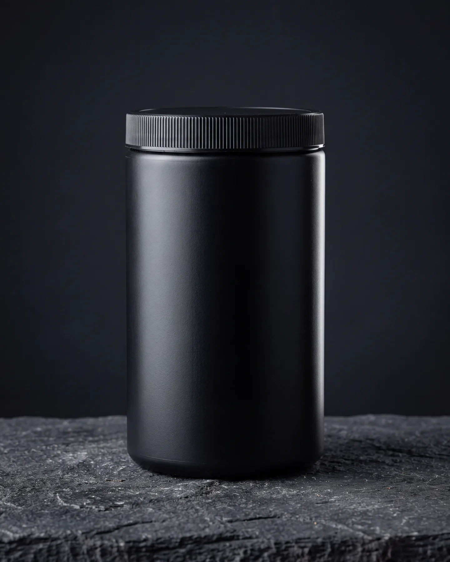 RUNE hero frame: matte black tub on dark stone, the raw generation